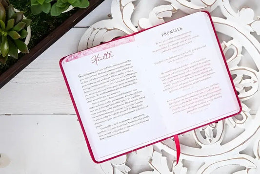 Devotional of Prayers & Promises for Healing - Devotionals open pink journal
