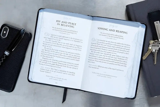 Think on These Things: Wisdom for Life from Proverbs - Devotionals open black journal