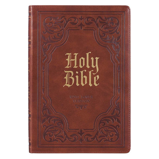 Brown leather-bound Bible with decorative embossing on a white background