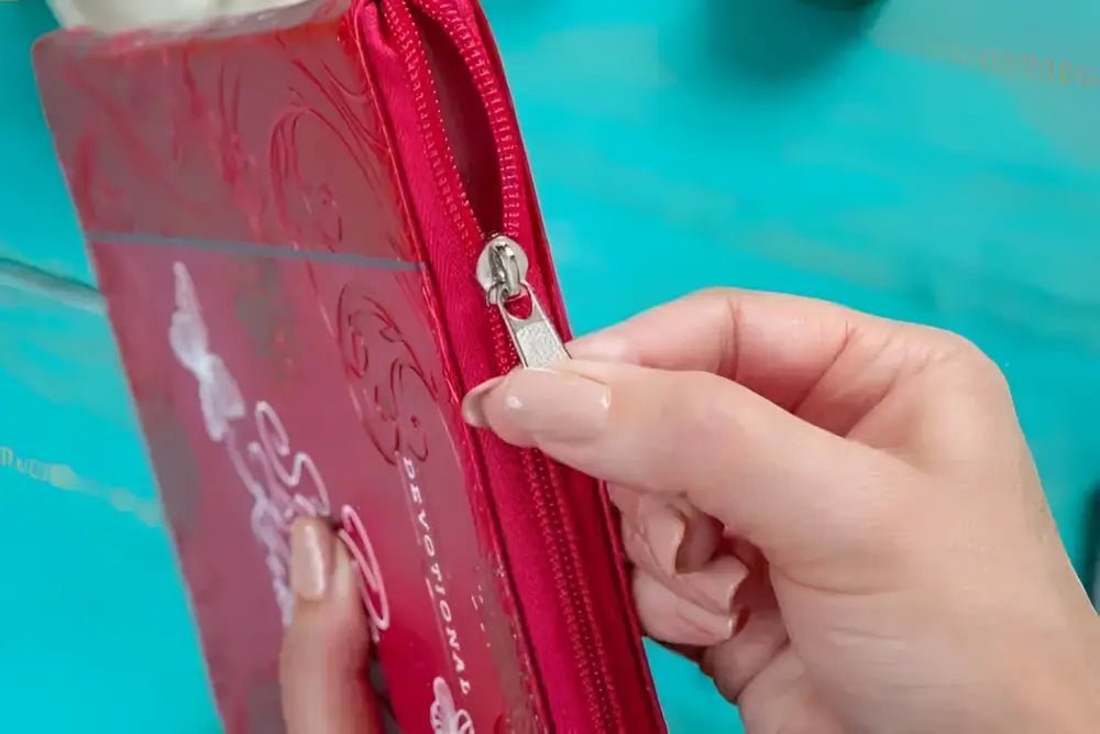 Be Still and Know Ziparound Faux Leather Devotional - Devotionals red zippered devotional book